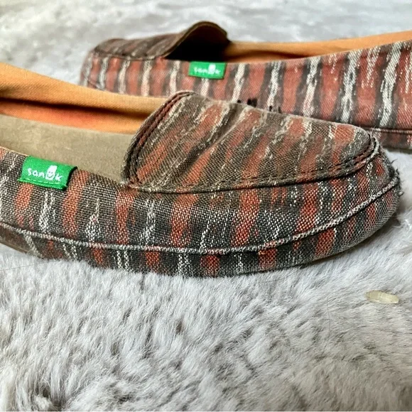 Sanuk slides in orange and cream animal print, size 6, good condition